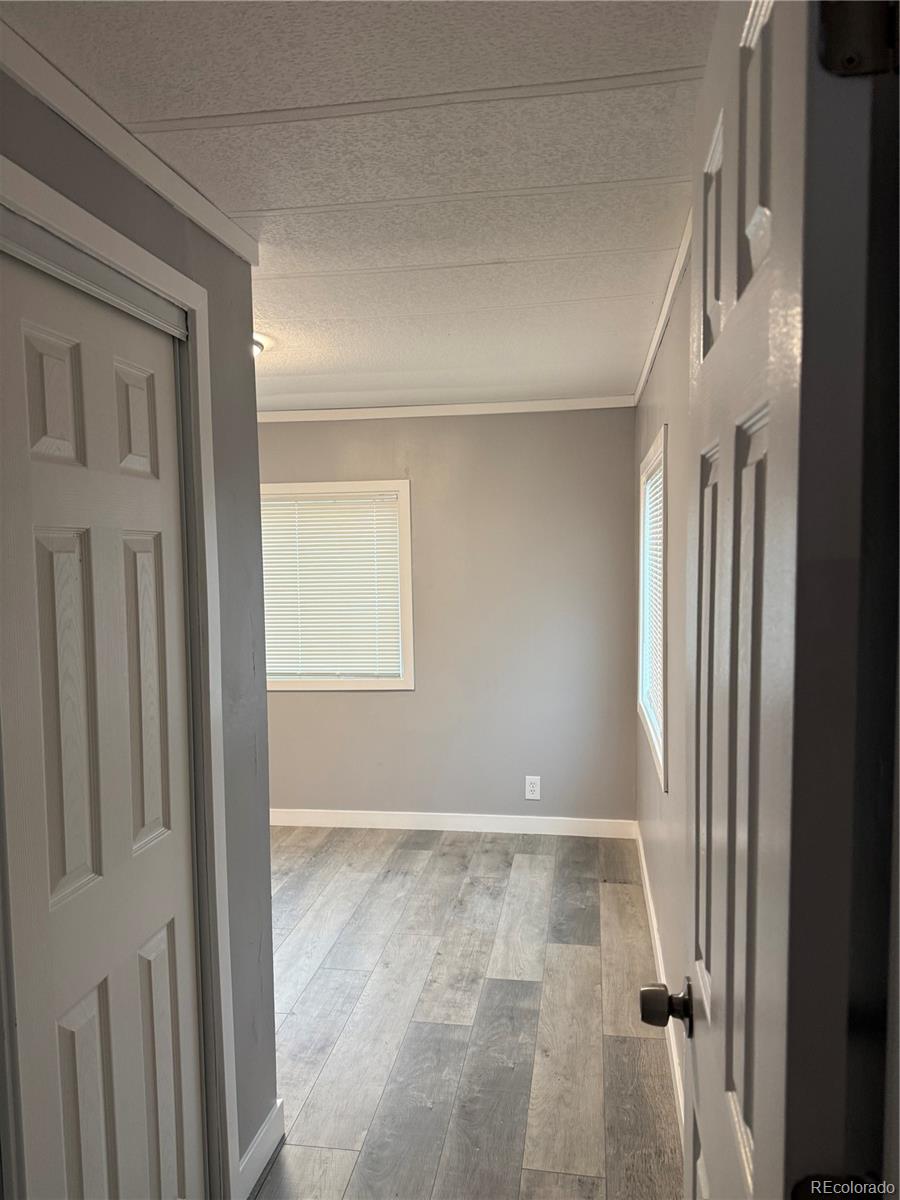17190 Mt Vernon Road, Unit 176 Golden, CO 80401 - Photo 17 of 39 a view of entryway with wooden floor