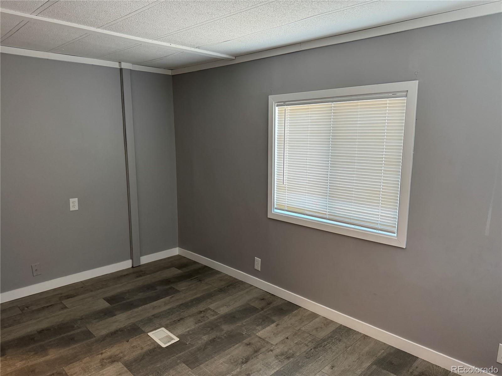 17190 Mt Vernon Road, Unit 176 Golden, CO 80401 - Photo 33 of 39 an empty room with a window