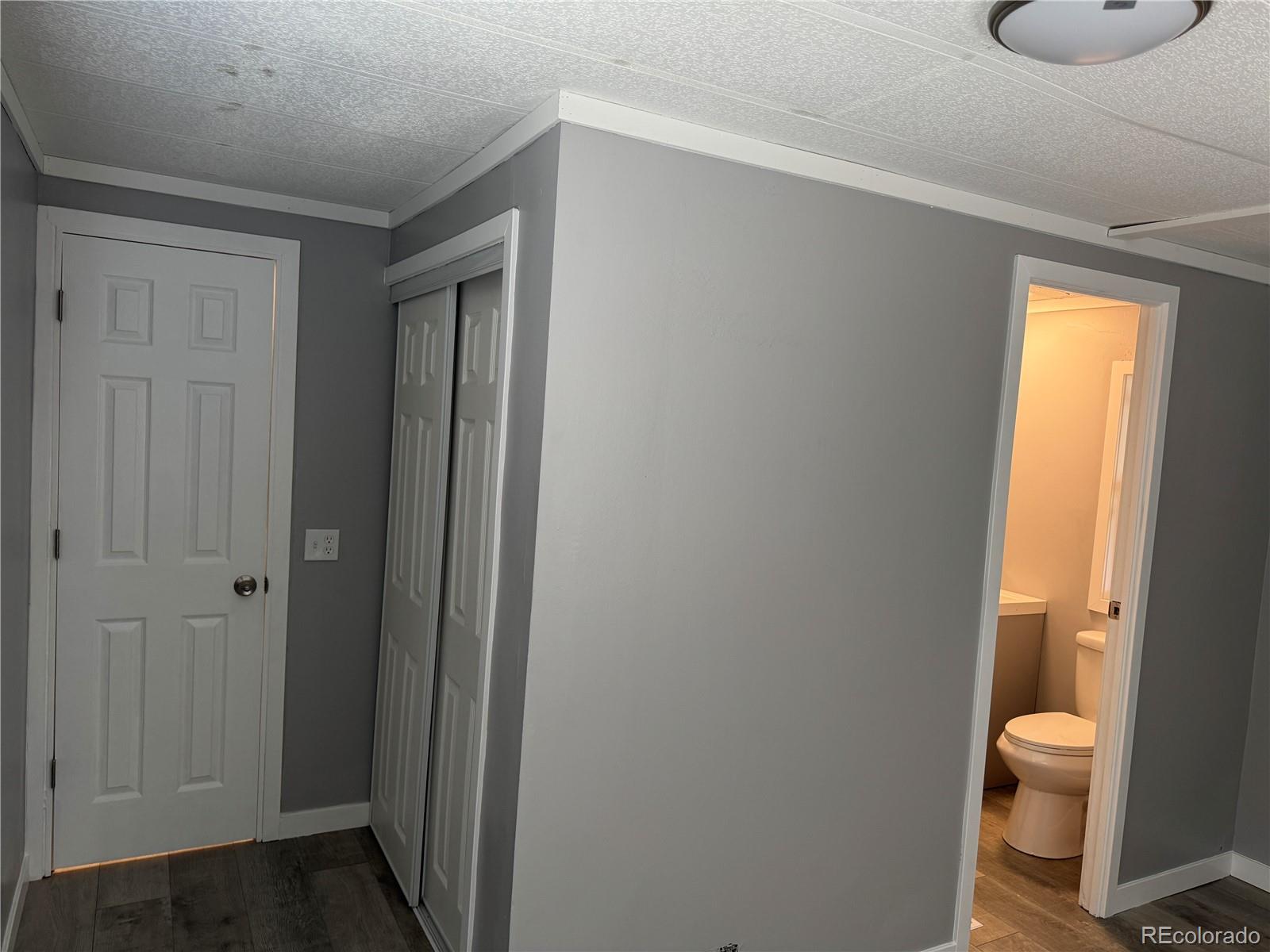 17190 Mt Vernon Road, Unit 176 Golden, CO 80401 - Photo 34 of 39 a bathroom with a toilet and a sink