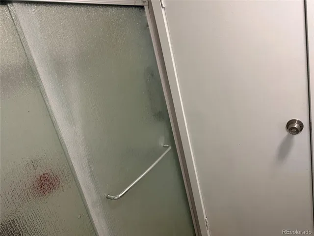 an empty room with wooden floor