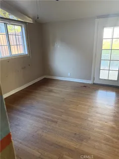 a view of an empty room and window