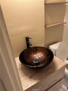 a bathroom with a bathtub and a toilet
