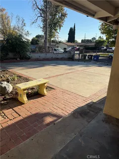 a view of a swimming pool with a lounge chairs
