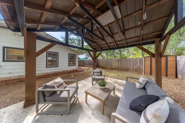 a outdoor living space with furniture and a couch