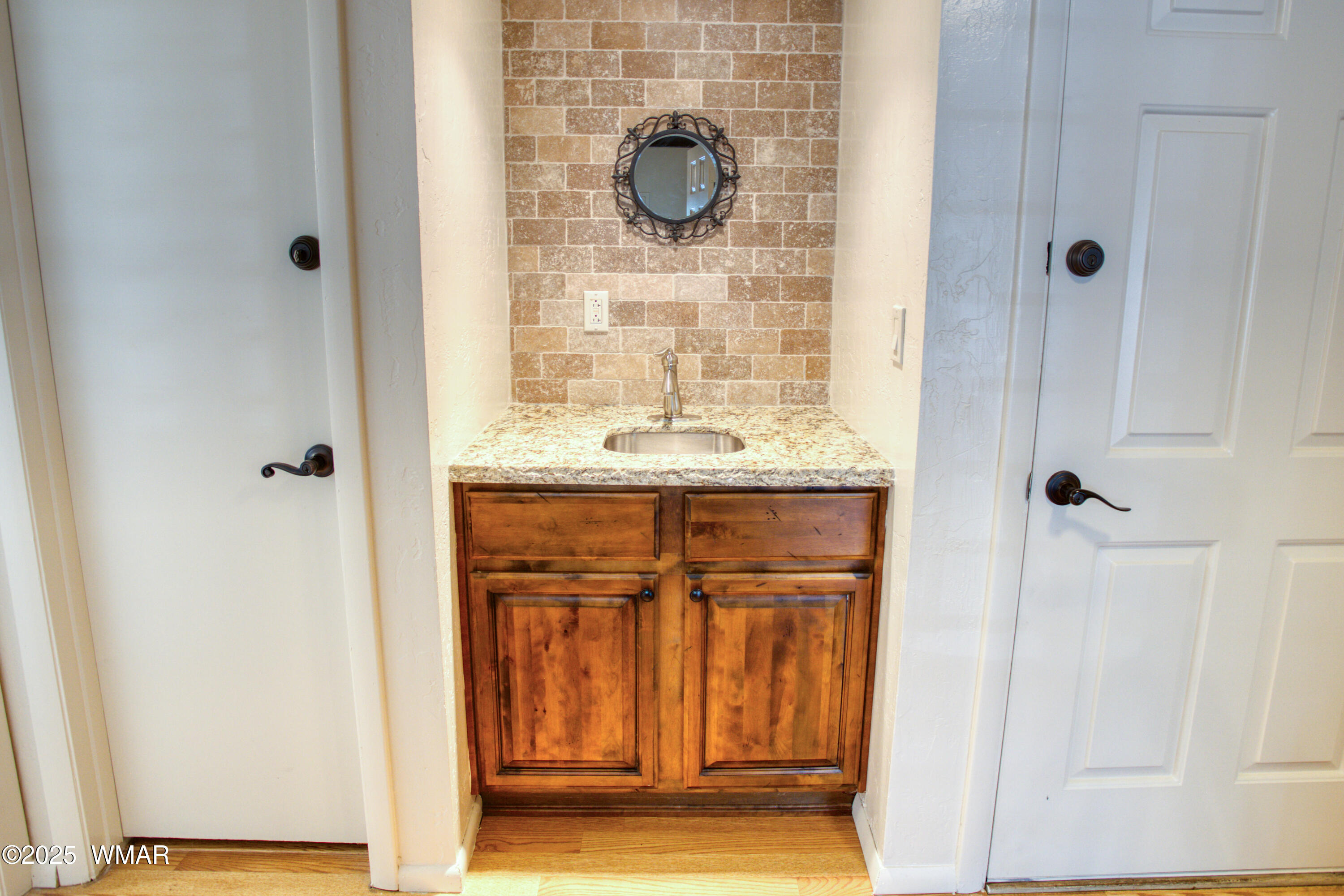 4568 Resort Loop Pinetop, AZ 85935 - Photo 8 of 24 a bathroom with a granite countertop shower a mirror and a sink