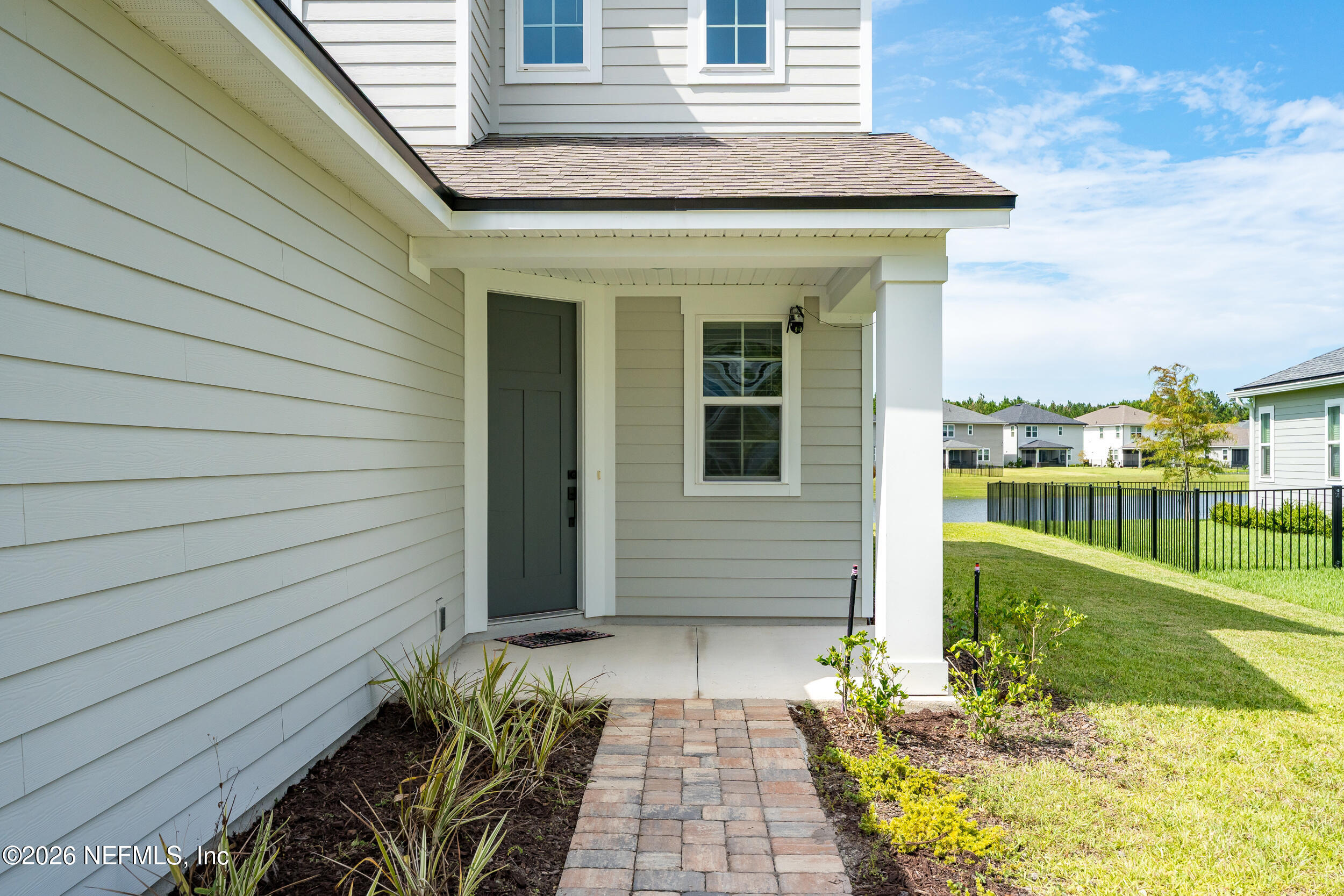 57 Cedar Elm Way St. Augustine, FL 32092 - Photo 5 of 65 a view of a house with a garden