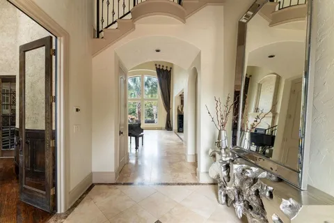 a view of livingroom with furniture and front door