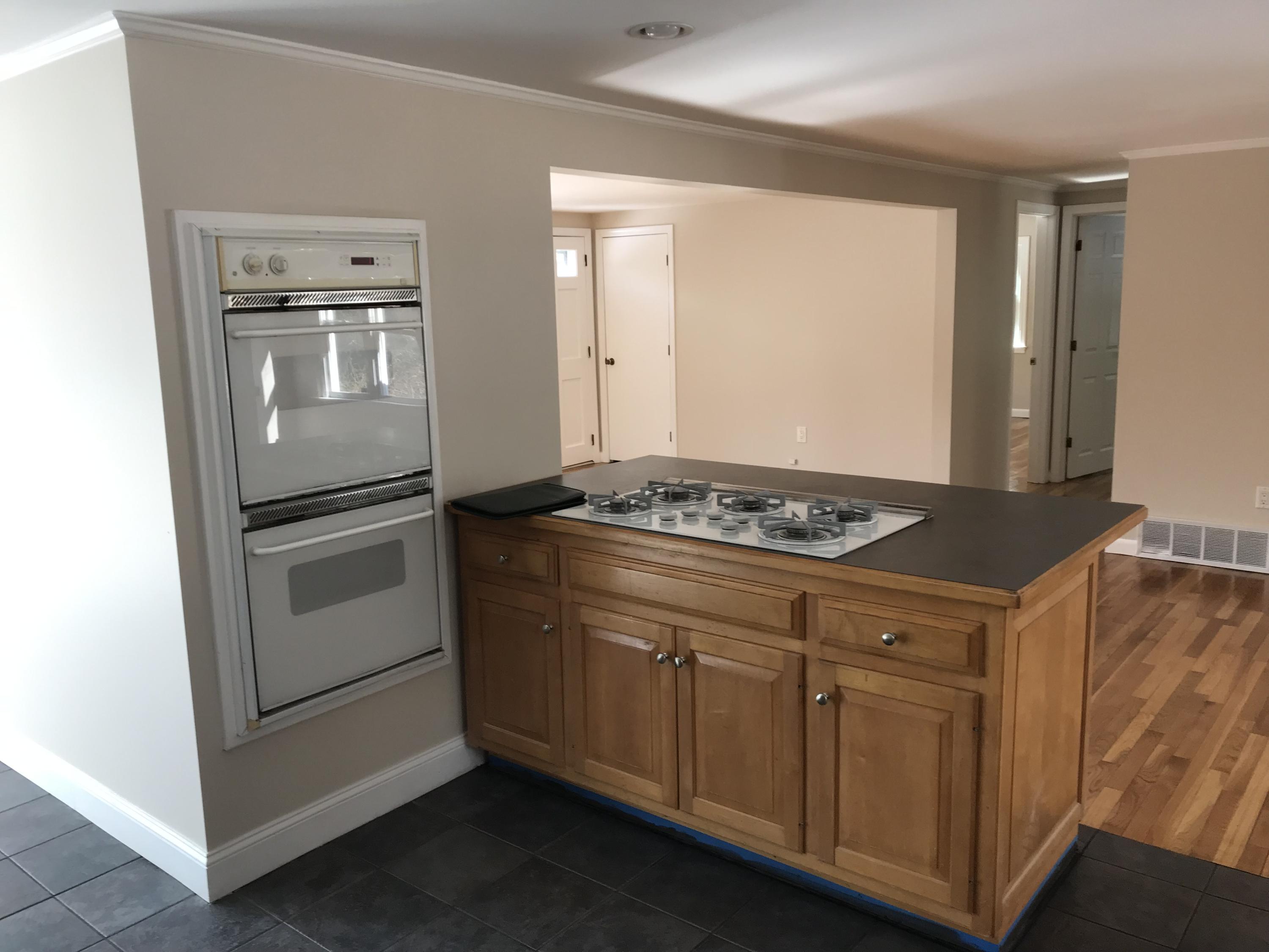 306 Old Mill Road Marstons Mills, MA 02648 - Photo 5 of 20 a kitchen with granite countertop cabinets and steel stainless steel appliances