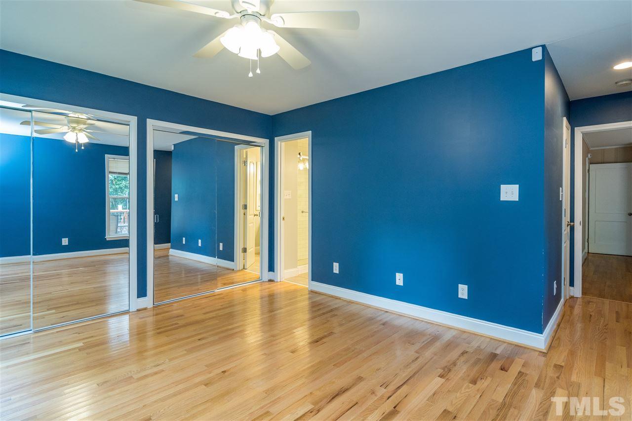 1234 Cross Link Road Raleigh, NC 27610 - Photo 15 of 26 a view of a livingroom with a chandelier