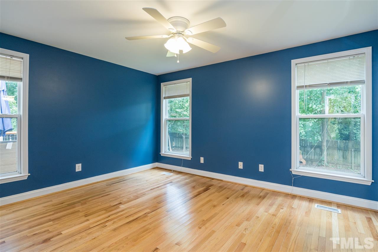 1234 Cross Link Road Raleigh, NC 27610 - Photo 16 of 26 a view of room with window and ceiling fan