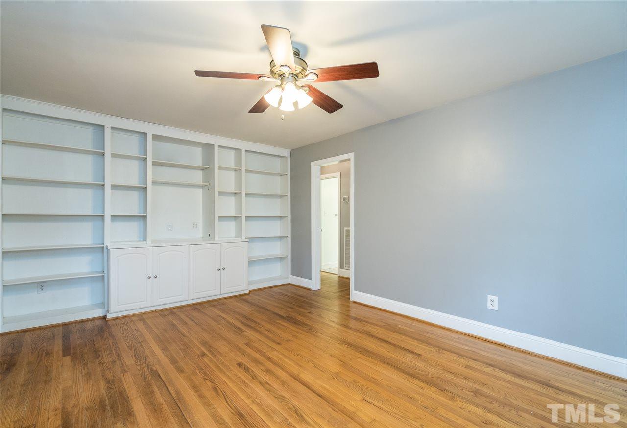 1234 Cross Link Road Raleigh, NC 27610 - Photo 3 of 26 wooden floor in an empty room