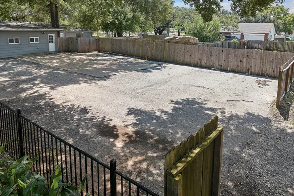 a view of a wooden fence