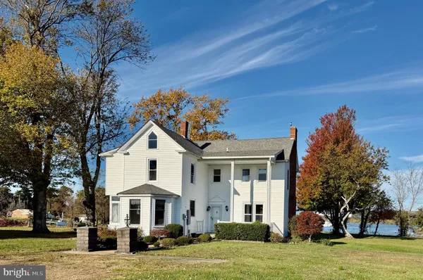 a front view of a house with a porch