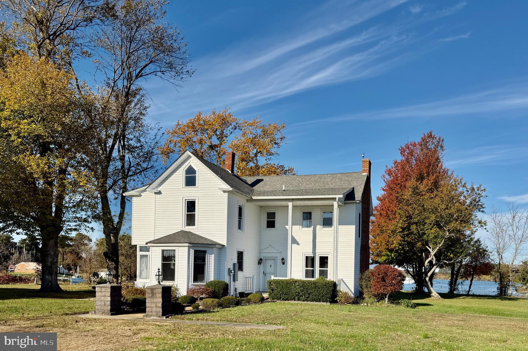a front view of a house with a porch
