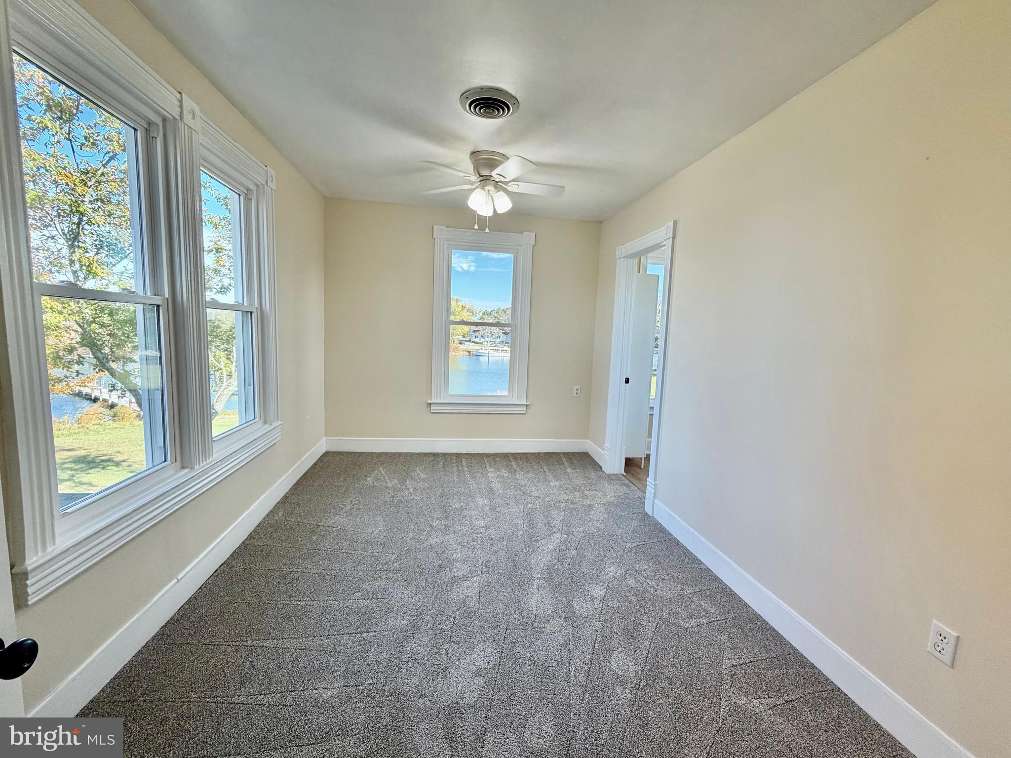 48600 Deep Cove Lane Ridge, MD 20680 - Photo 24 of 46 a view of an empty room with a window