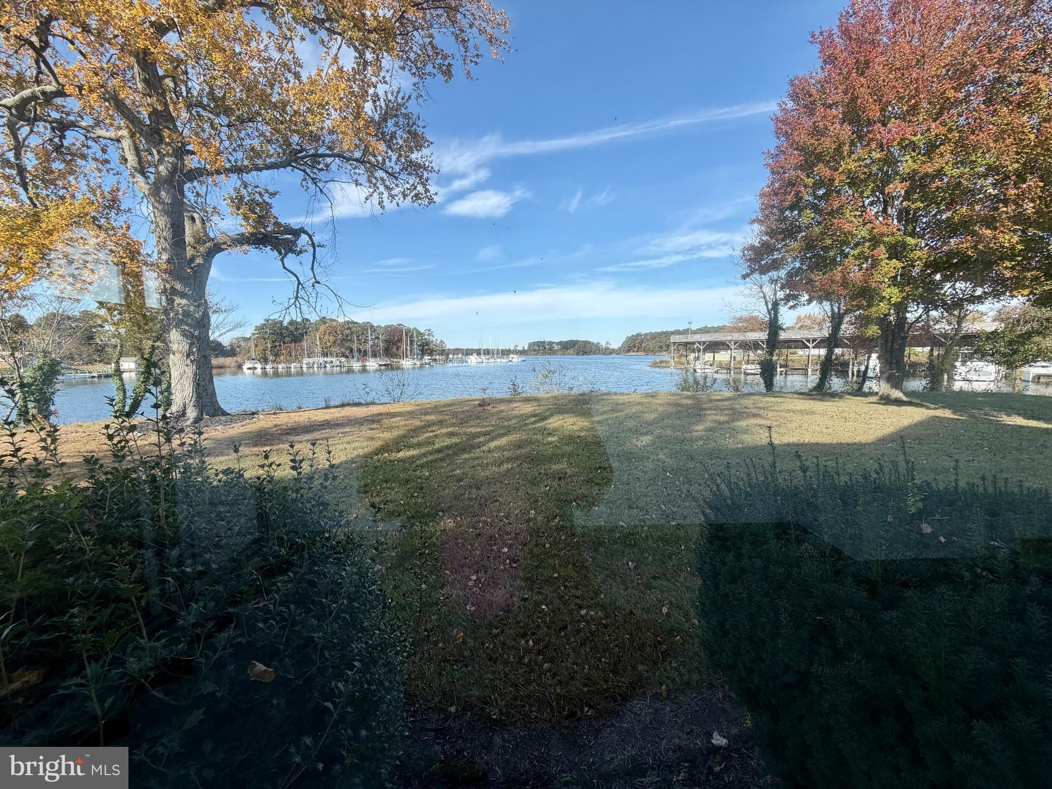 48600 Deep Cove Lane Ridge, MD 20680 - Photo 41 of 46 a view of a lake with a yard