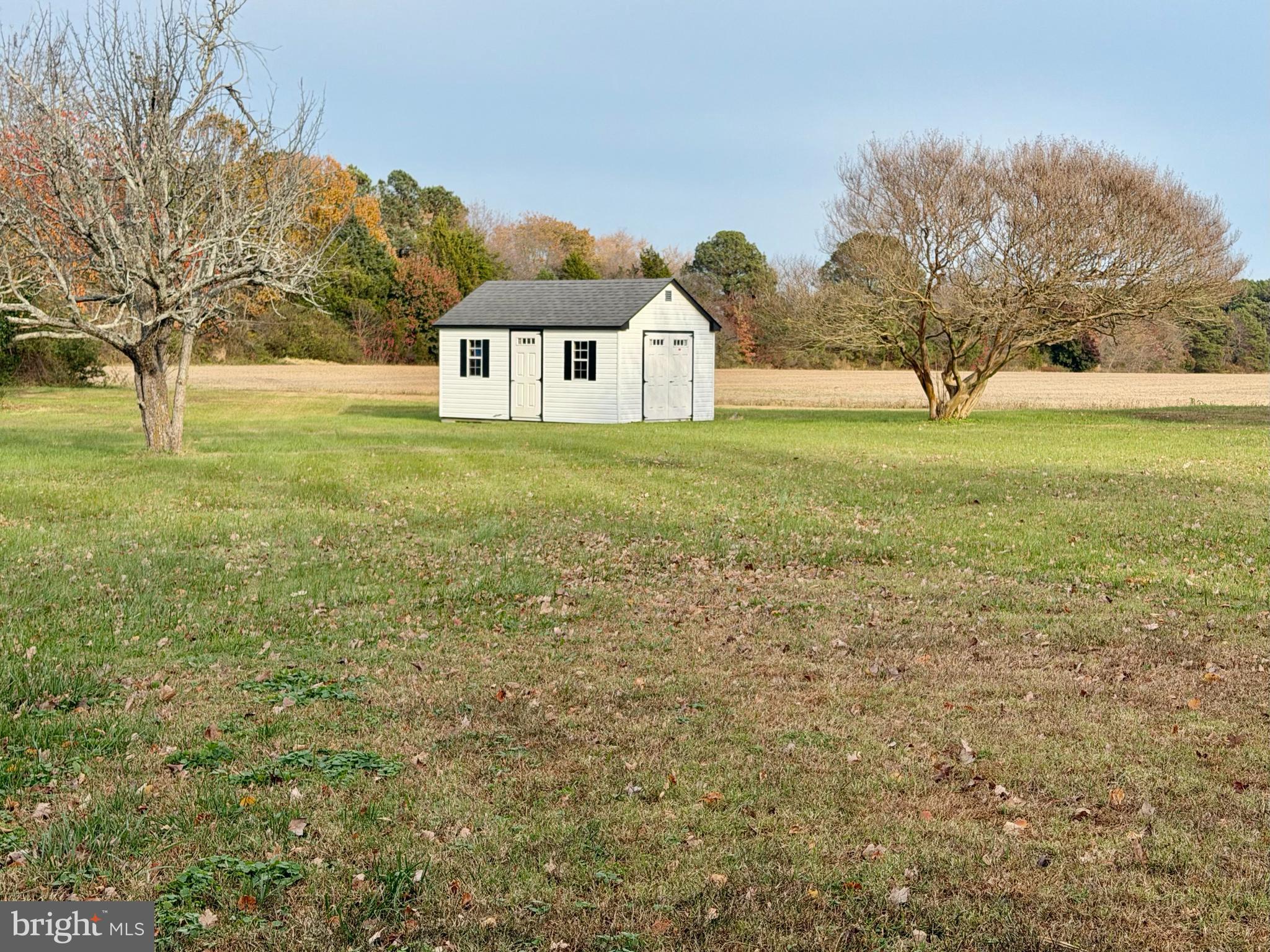 48600 Deep Cove Lane Ridge, MD 20680 - Photo 46 of 46 a view of a house with a yard