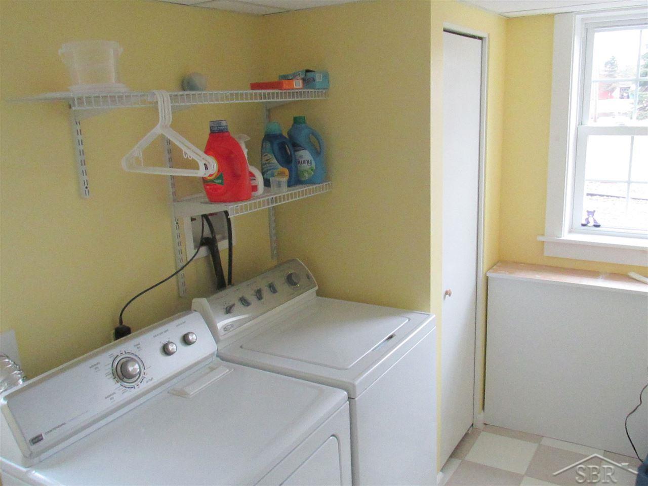 2385 South Fordney Road Hemlock, MI 48626 - Photo 12 of 14 Bright laundry room