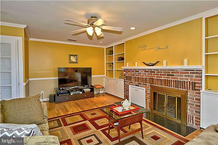 24728 Ridge Road Damascus, MD 20872 - Photo 11 of 30 Family Room with built-in bookcases