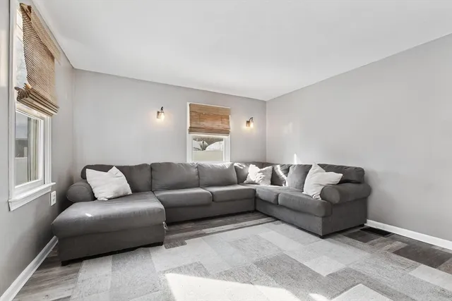 a living room with furniture and a couch