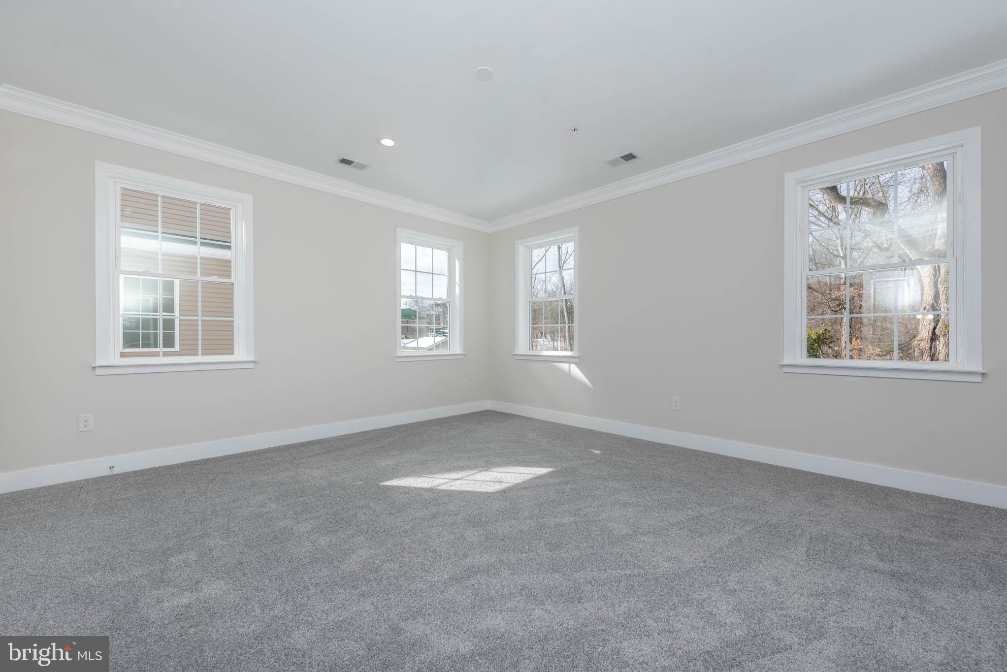 9624 Harford Road Parkville, MD 21234 - Photo 15 of 39 a view of an empty room with windows