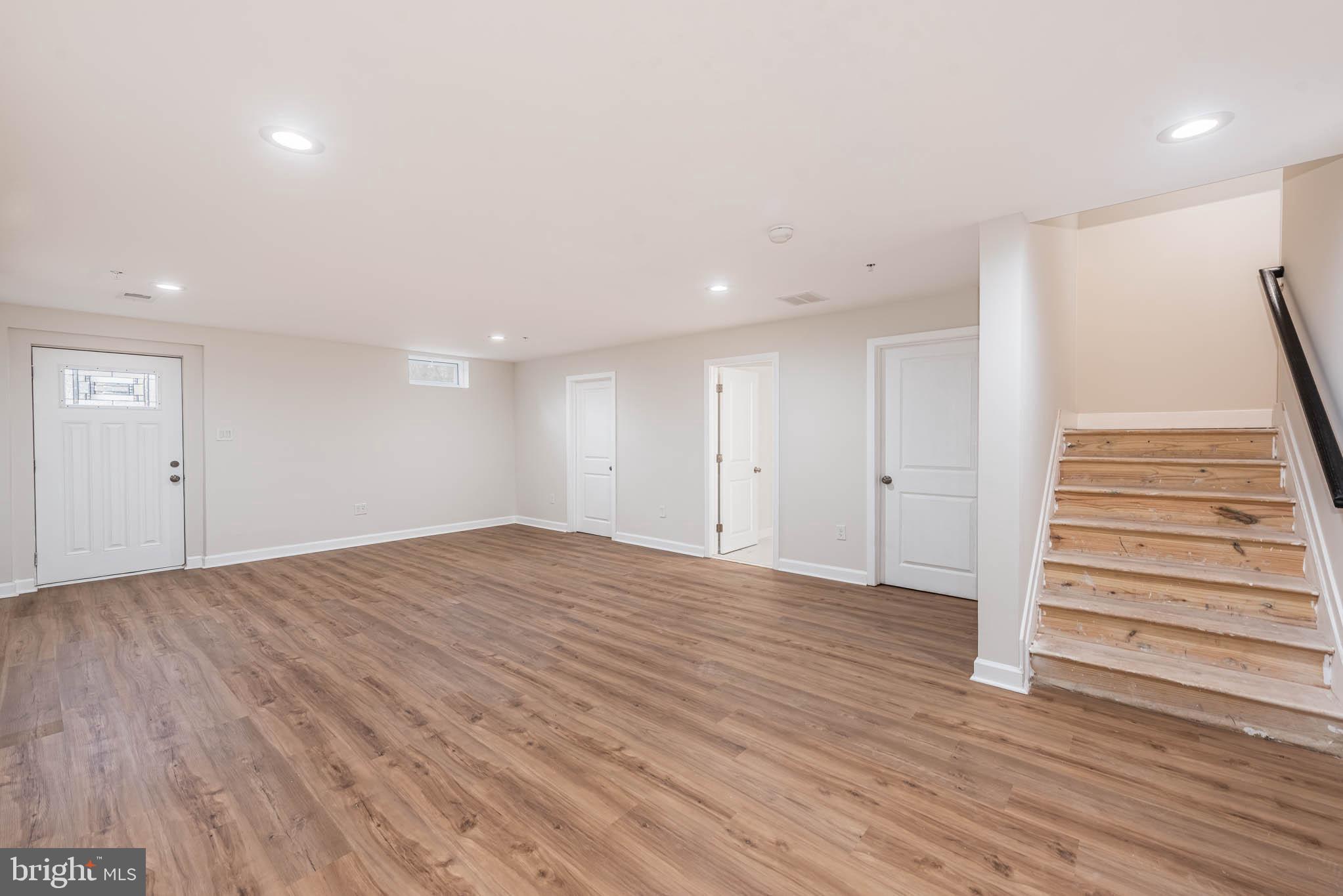 9624 Harford Road Parkville, MD 21234 - Photo 29 of 39 a view of empty room with wooden floor