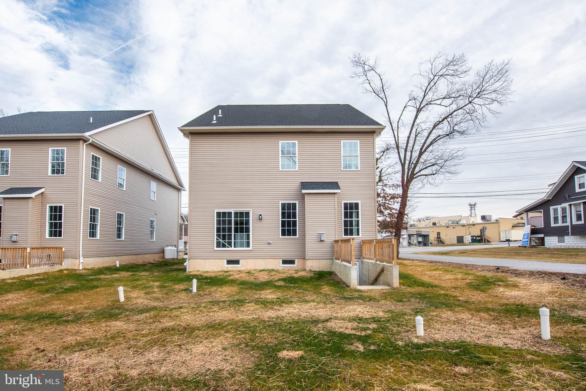 9624 Harford Road Parkville, MD 21234 - Photo 35 of 39 a house view with swimming pool in front of it