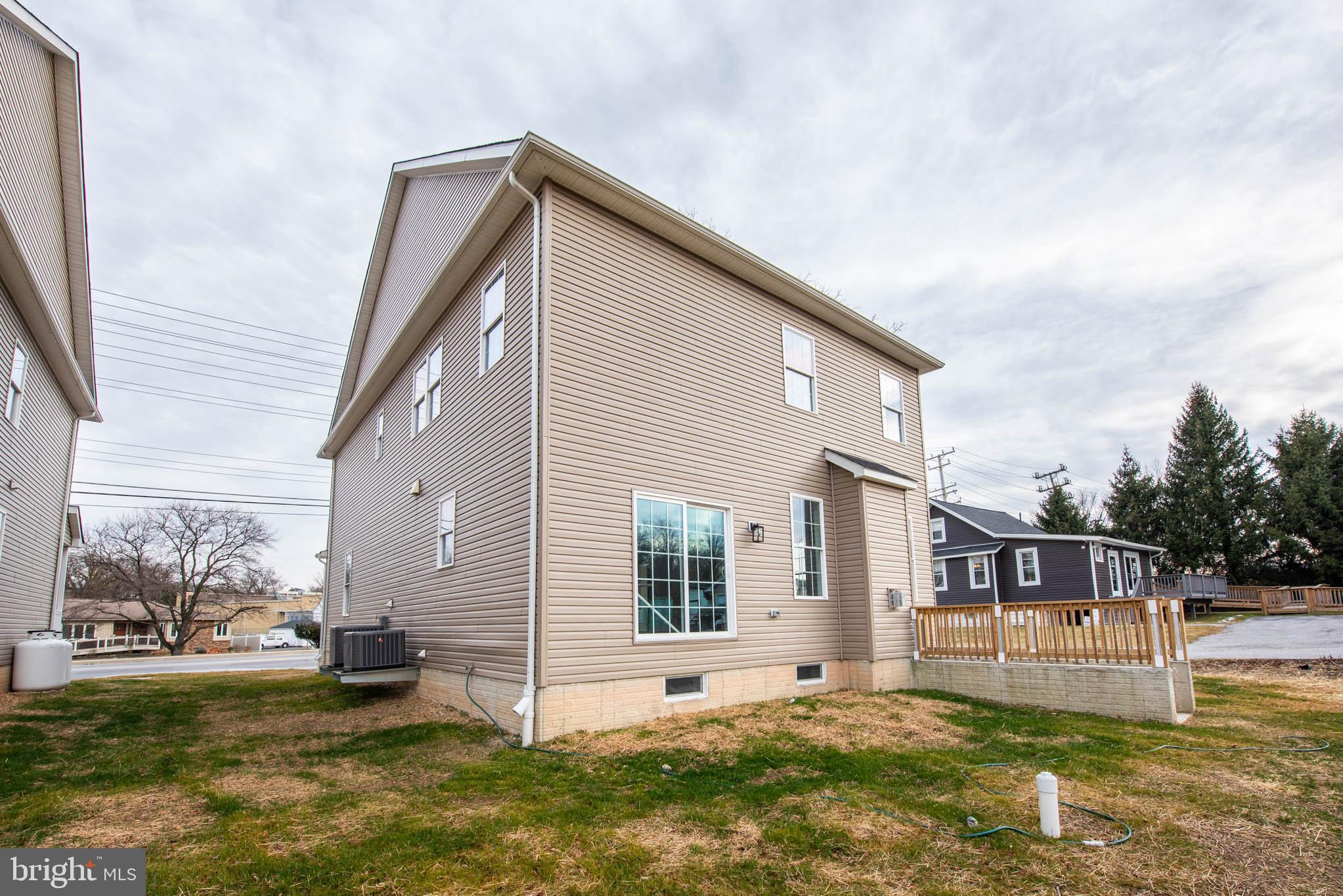 9624 Harford Road Parkville, MD 21234 - Photo 36 of 39 a view of a house with a big yard