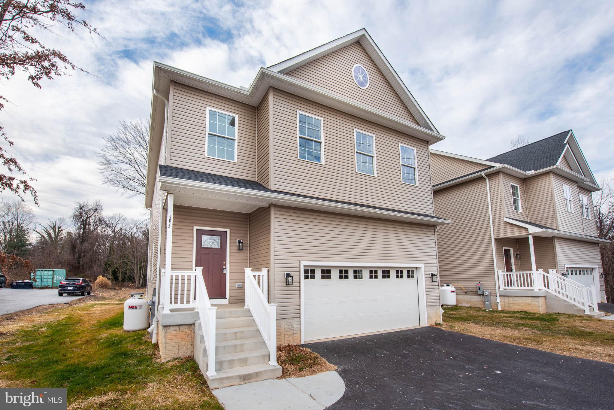 9624 Harford Road Parkville, MD 21234 - Photo 38 of 39 a front view of a house with a yard