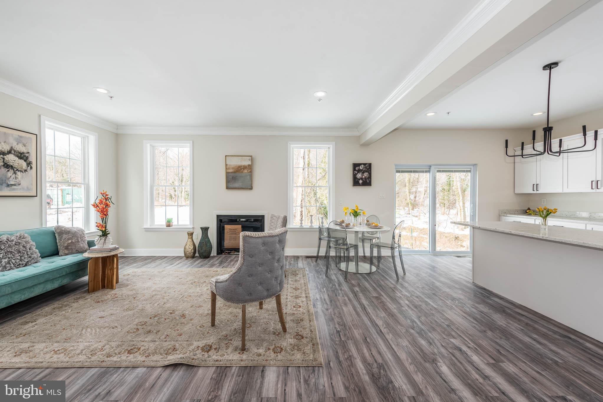 9624 Harford Road Parkville, MD 21234 - Photo 7 of 39 a living room with furniture and wooden floor