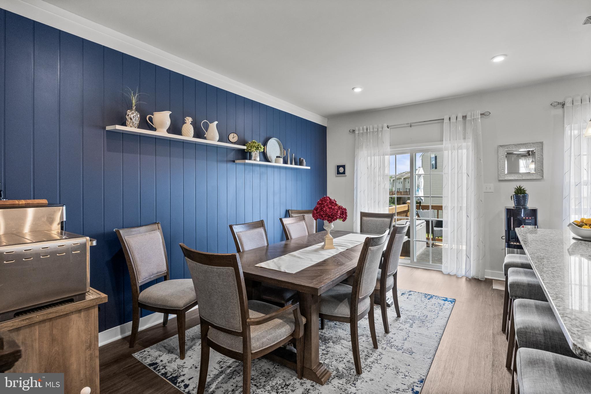 177 Nathan Drive Cinnaminson, NJ 08077 - Photo 18 of 42 a dining room with furniture and a kitchen view
