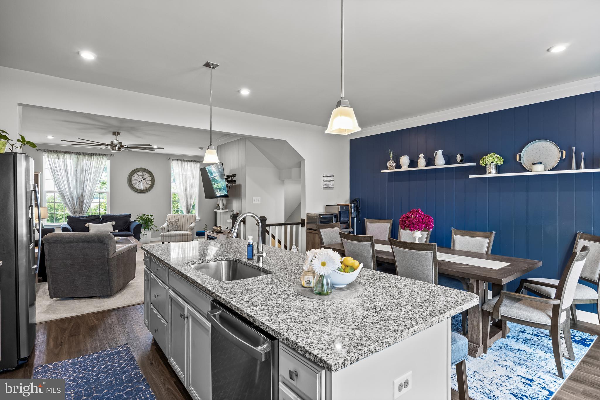 177 Nathan Drive Cinnaminson, NJ 08077 - Photo 22 of 42 a kitchen with a table and chairs in it