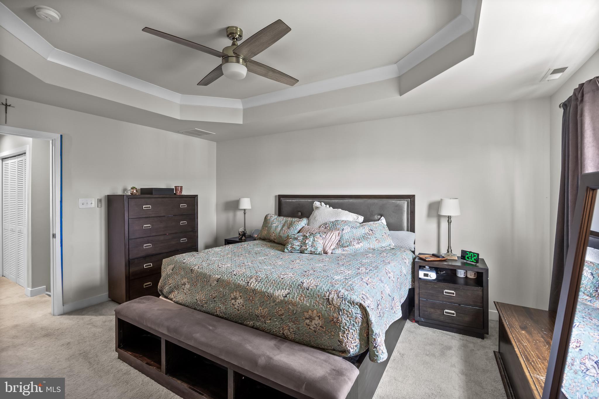 177 Nathan Drive Cinnaminson, NJ 08077 - Photo 24 of 42 a bedroom with a bed and a dresser