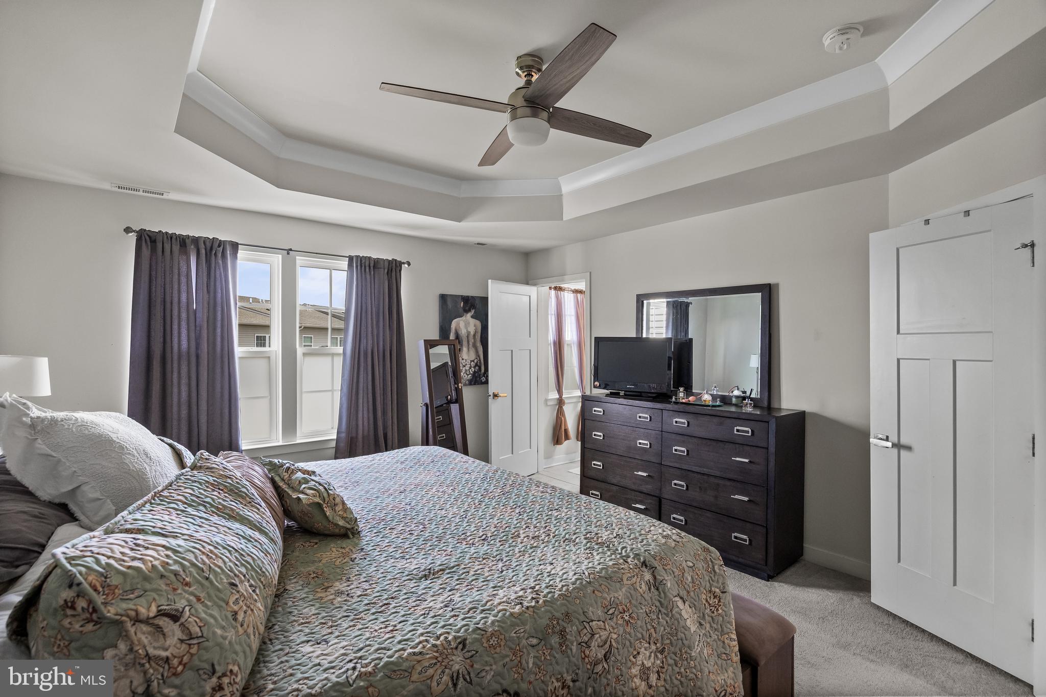 177 Nathan Drive Cinnaminson, NJ 08077 - Photo 25 of 42 a bedroom with a bed and a flat screen tv