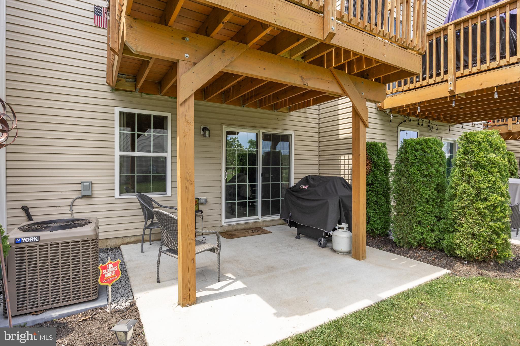 177 Nathan Drive Cinnaminson, NJ 08077 - Photo 33 of 42 a backyard of a house with yard and outdoor seating