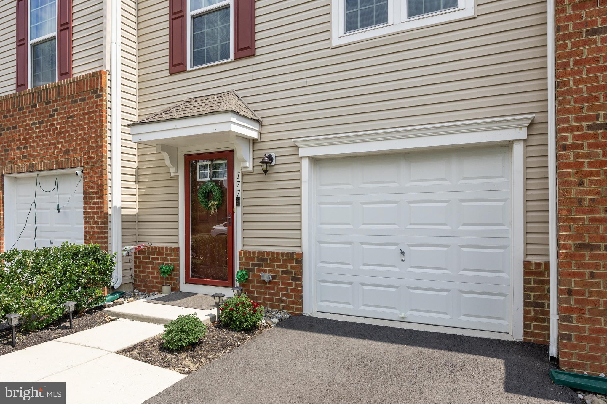 177 Nathan Drive Cinnaminson, NJ 08077 - Photo 4 of 42 a front view of a house