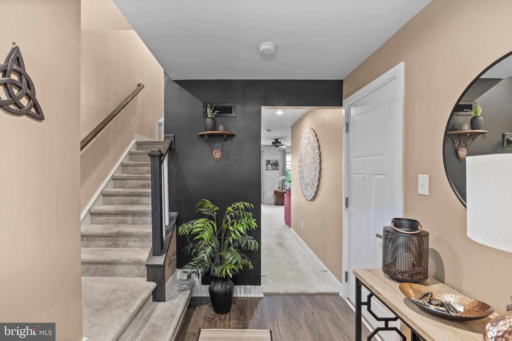 177 Nathan Drive Cinnaminson, NJ 08077 - Photo 6 of 42 a view of entryway with wooden floor