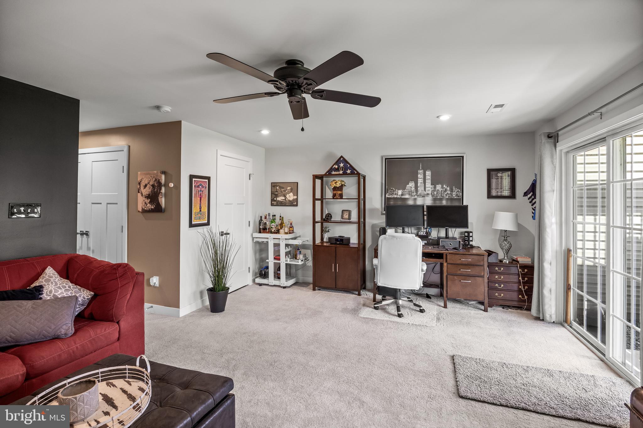 177 Nathan Drive Cinnaminson, NJ 08077 - Photo 10 of 42 a view of a livingroom with workspace and a couch