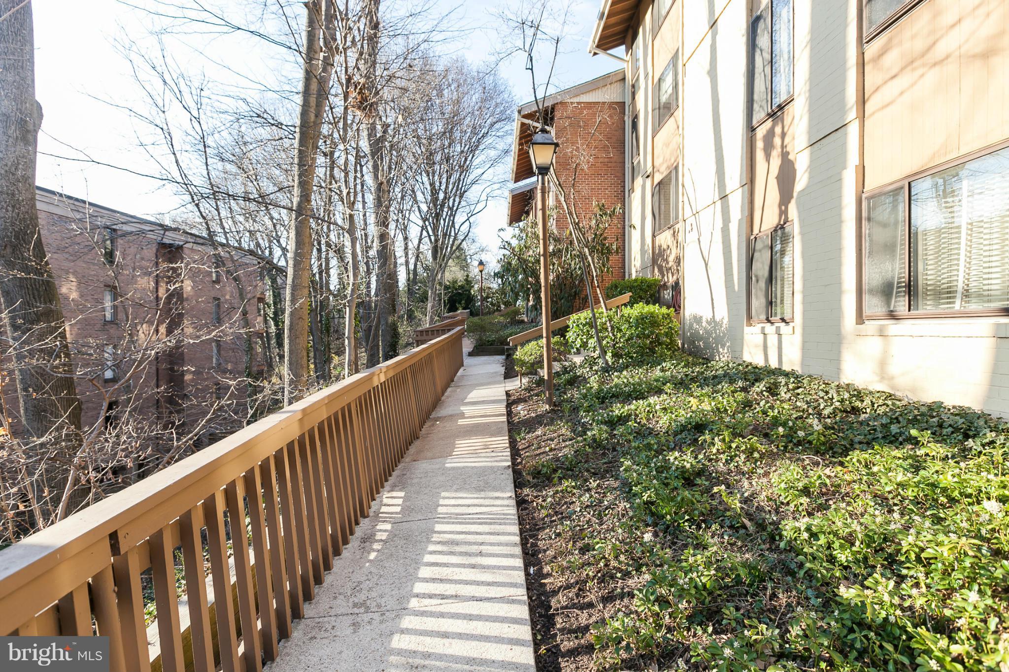 16 Cross Keys Road, Unit 16D Baltimore, MD 21210 - Photo 24 of 29 a view of a house with a large windows