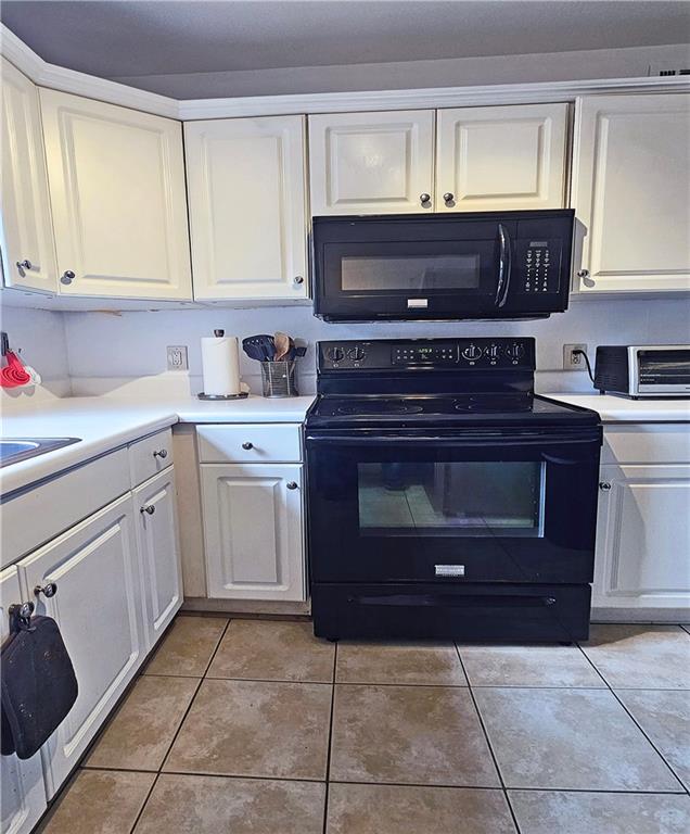 692 Argonne Avenue Northeast, Unit 2 Atlanta, GA 30308 - Photo 7 of 17 a kitchen with a cabinets and white stove