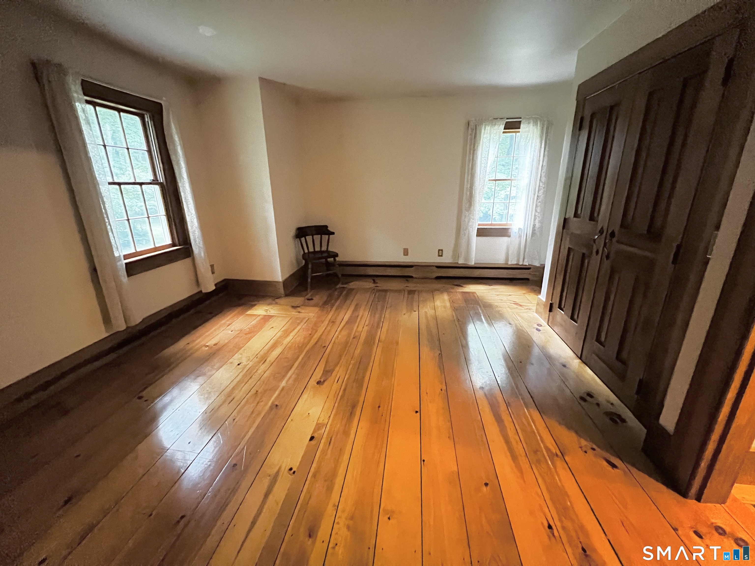 38 Clark Hill Road East Haddam, CT 06423 - Photo 30 of 35 a view of a room with wooden floor and stairs