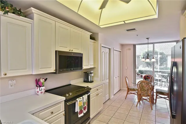 a bathroom with a sink double vanity and a mirror