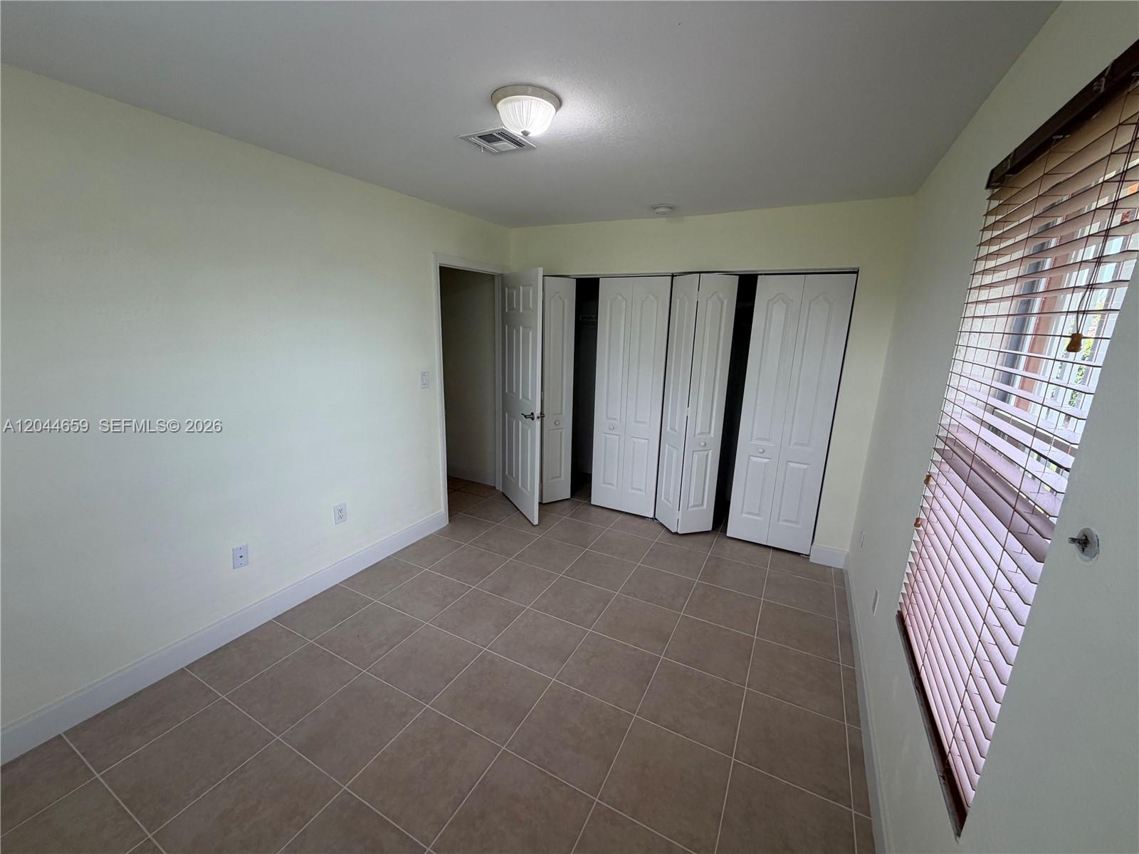 10530 Southwest 183rd Street, Unit 2 Miami, FL 33157 - Photo 11 of 19 Bedroom 3