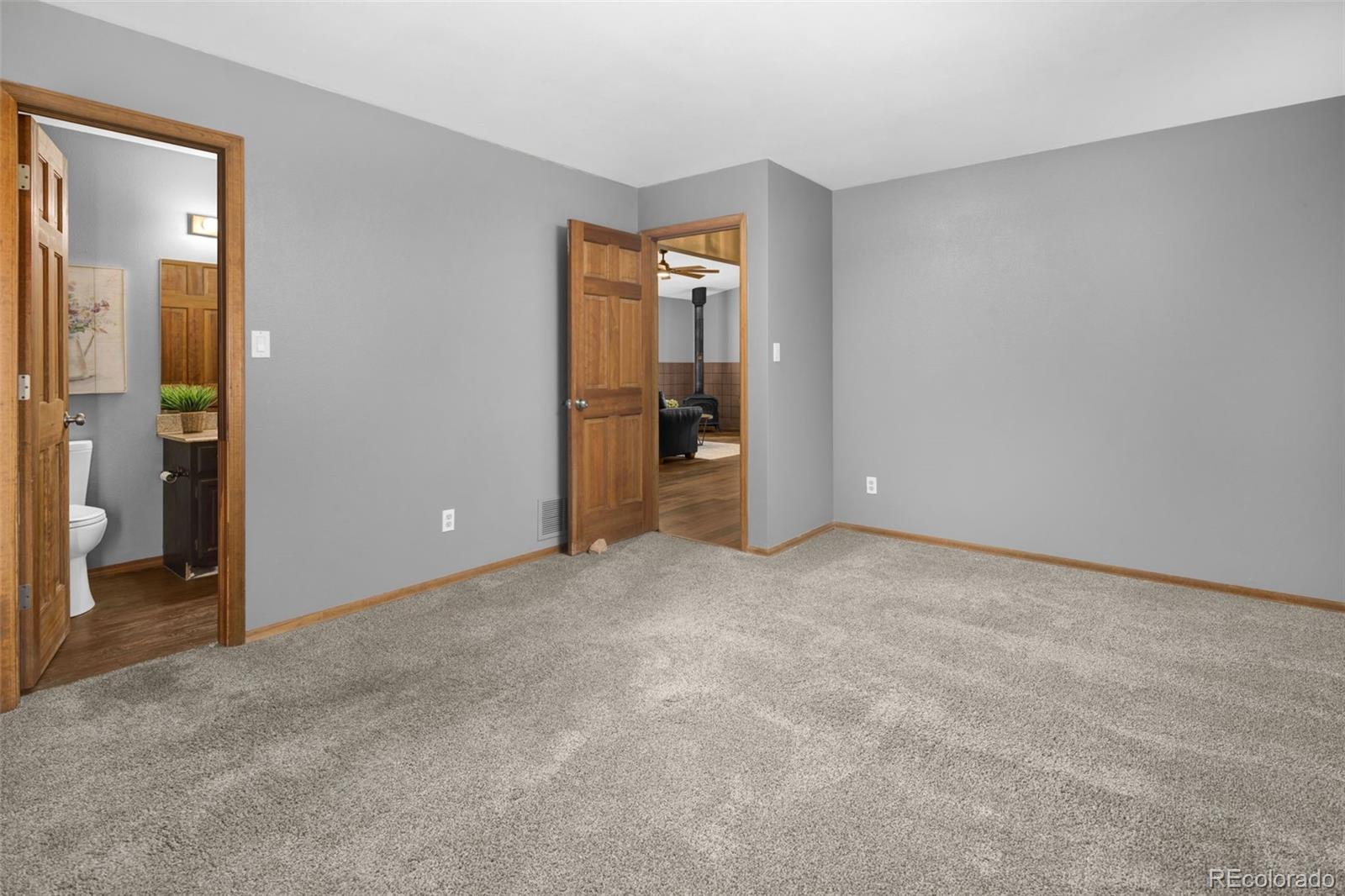 32252 Steven Way Conifer, CO 80433 - Photo 17 of 47 an empty room with closet and a bathroom