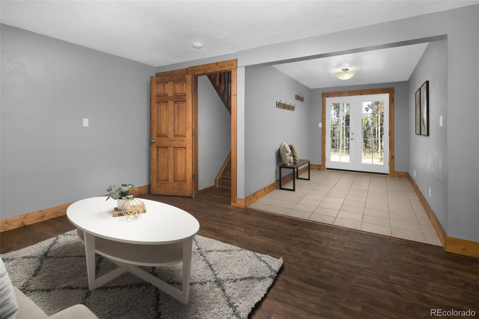 32252 Steven Way Conifer, CO 80433 - Photo 4 of 47 a living room with furniture a window and a table