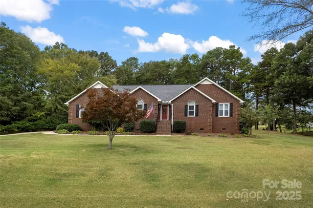 a house view with a garden space