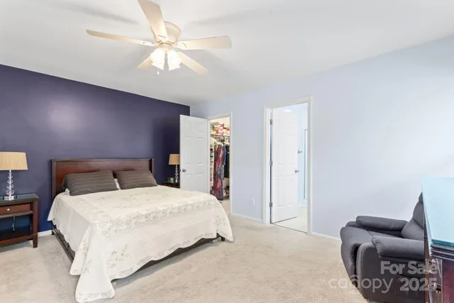 a bedroom with a bed and furniture