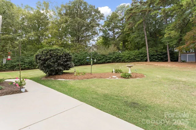 a view of a playground with basketball court