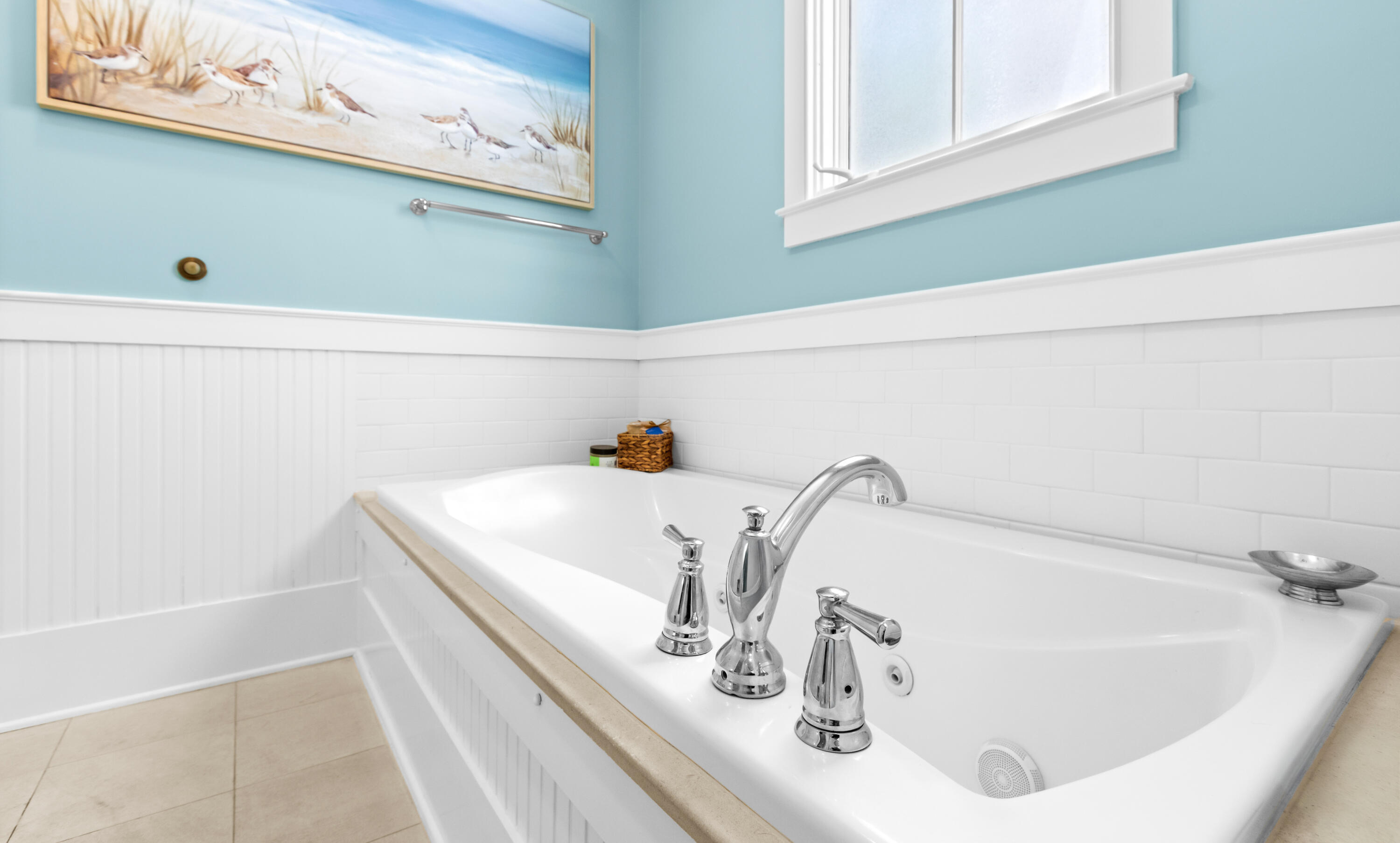 1660 East County Highway 30A, Unit 101 Santa Rosa Beach, FL 32459 - Photo 22 of 67 a bathroom with a white bath tub and a window