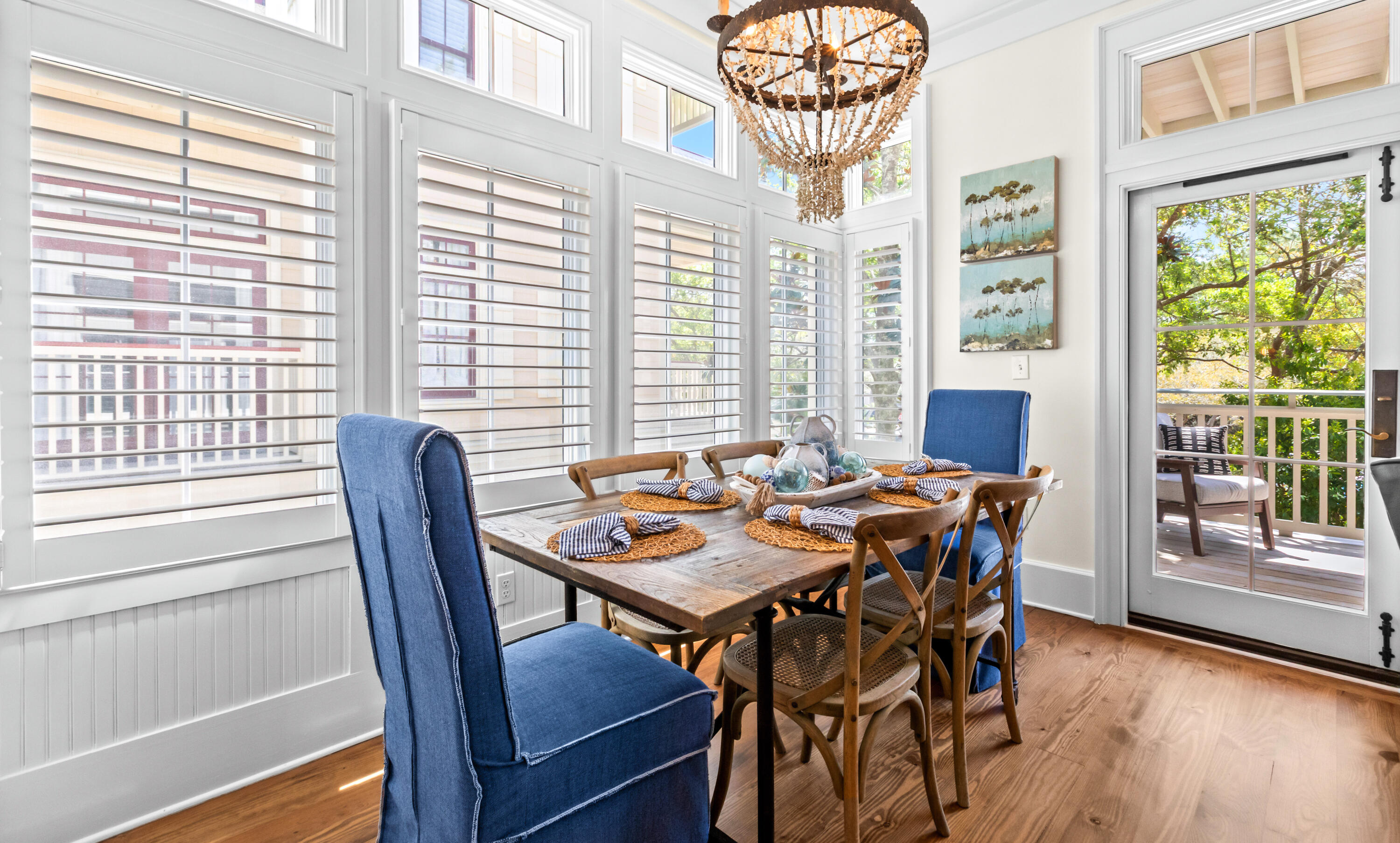 1660 East County Highway 30A, Unit 101 Santa Rosa Beach, FL 32459 - Photo 33 of 67 a view of a dining room with furniture window and wooden floor